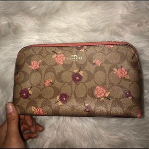 This is a brand new, coach mini bag/ makeup bag!